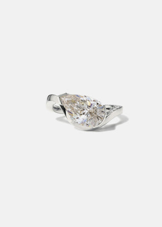 Stunning 2.0ct pear pave moissanite wedding band angled view showing its sparkle