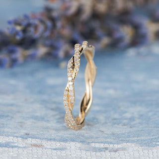 Refined round full eternity moissanite wedding band side profile view image 2