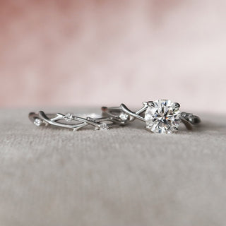 Vintage 1.0ct round halo moissanite wedding band shown on a finger