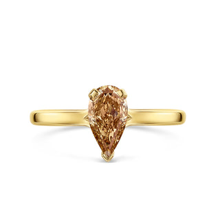 pear moissanite ring brown center front view