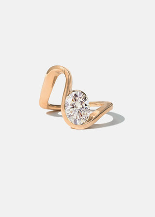 Lustrous 1.2ct oval moissanite wedding band angled view showing its sparkle