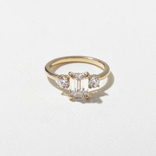 emerald ring, moissanite emerald ring, emerald diamond ring, Best three stone engagement rings for women, Affordable three stone engagement rings online, Unique three stone engagement rings for her 
