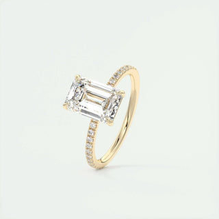 Gorgeous 1.91ct emerald solitaire moissanite ring shown on a finger