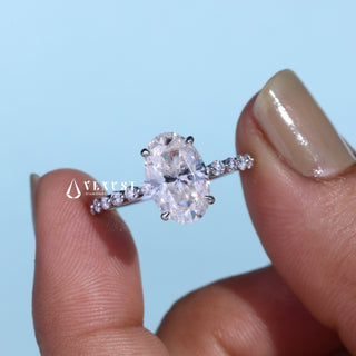 Brilliant 2.0ct oval hidden halo moissanite ring angled view showing its sparkle