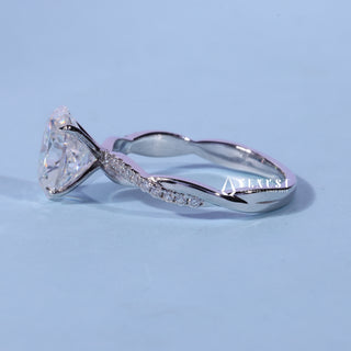 Angled view of the Oval Cut Pave Infinity Moissanite Engagement Ring band and setting