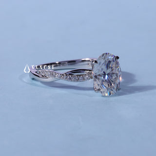 Top view of the Oval Cut Pave Infinity Moissanite Engagement Ring centre stone