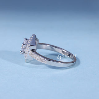 Angled view of Classic Round Moissanite Pave Engagement Ring with Halo