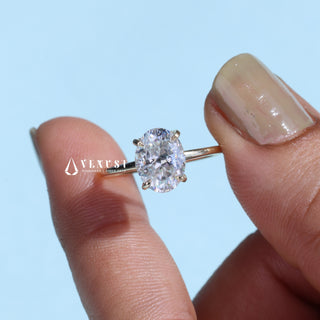 Gorgeous 1.0ct oval hidden halo moissanite ring angled view showing its sparkle
