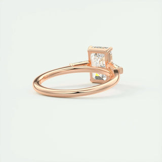 Sparkling 1.91ct emerald three stone moissanite ring shown on a finger