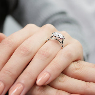 Graceful 2.30ct cushion halo moissanite ring tilted view catching the light