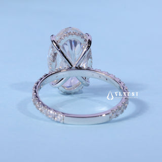 Angled view of the Oval Cut Moissanite Pave Hidden Halo Engagement Ring band and setting