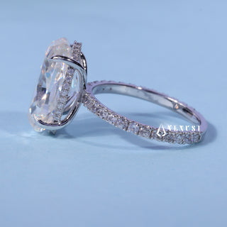 Front standing view of the Oval Cut Moissanite Pave Hidden Halo Engagement Ring showing the prong setting