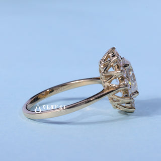 Oval Cut Moissanite Halo Cathedral Setting Engagement Ring resting on its side showing the slim band
