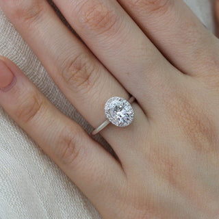Vintage 1.50ct oval halo moissanite ring macro detail of the stones