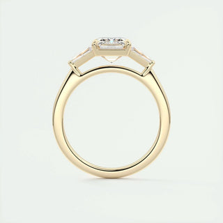 Graceful 1.91ct emerald three stone moissanite ring shown on a finger