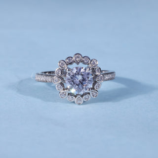 Round Moissanite Channel Set Engagement Ring with Halo Pave front view