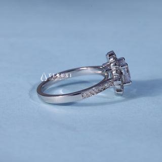 Angled view of Round Moissanite Channel Set Engagement Ring with Halo Pave