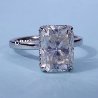 Hidden Halo Cathedral Radiant Cut Moissanite Ring resting on its side showing the slim band