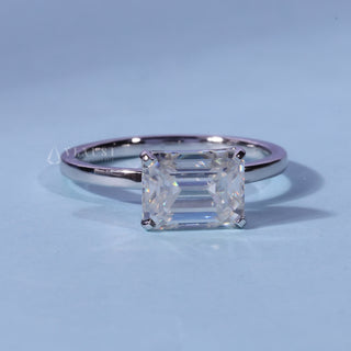 Solitaire Moissanite East West Emerald Cut Ring front view with upright centre stone
