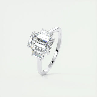Luminous 1.91ct emerald three stone moissanite ring side profile view