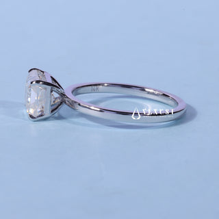 Front standing view of the Solitaire Moissanite East West Emerald Cut Ring showing the prong setting