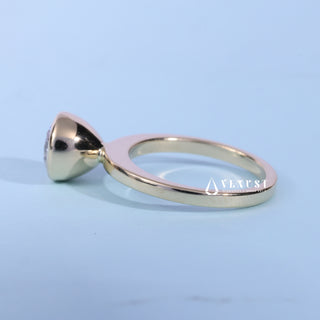 Front standing view of the Bezel Halo Solitaire Round Cut Moissanite Ring showing the prong setting