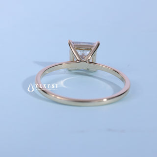 Solitaire Princess Cut Moissanite Engagement Ring resting on its side showing the slim band