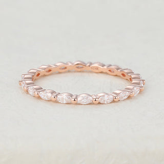 Timeless 1.44ct marquise full eternity moissanite wedding band angled view showing its sparkle