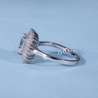 Angled view of Moissanite Emerald Cut Engagement Ring with Halo Cluster