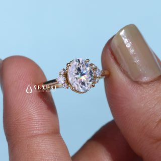 Vintage 1.0ct oval cluster moissanite ring angled view showing its sparkle