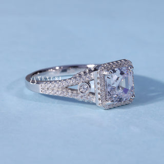 Angled view of Asscher Cut Moissanite Split Shank Halo Engagement Ring