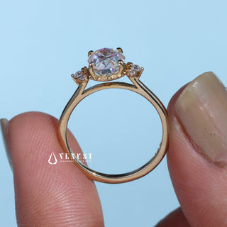 Vintage 1.0ct oval cluster moissanite ring shown on a finger