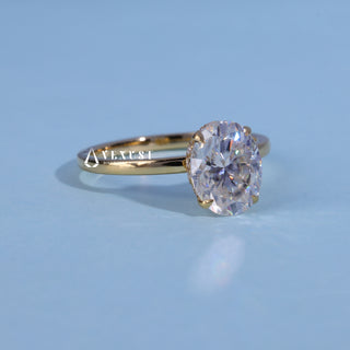 Front standing view of the Hidden Halo Oval Cut Moissanite Engagement Ring showing the prong setting