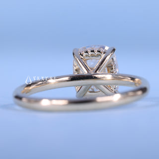 Brilliant 1.50ct cushion hidden halo moissanite ring shown on a finger