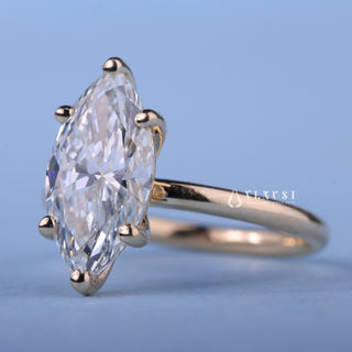 Lustrous 1.50ct marquise solitaire moissanite ring angled view showing its sparkle