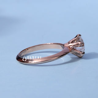 Front standing view of the Solitaire Round Cut Moissanite Ring showing the prong setting
