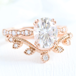 Elegant 2.0ct oval halo moissanite ring angled view showing its sparkle