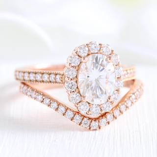 Classic 1.50ct oval halo moissanite ring angled view showing its sparkle