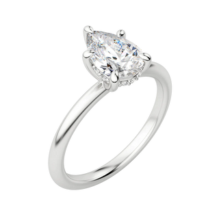 Brilliant 1.33ct pear hidden halo moissanite ring close up of the setting