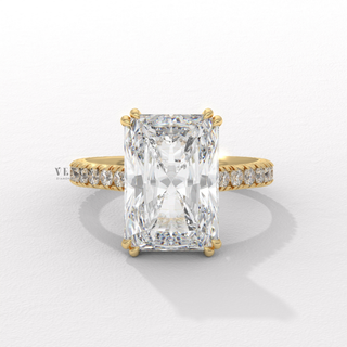 Front view of a radiant cut moissanite engagement ring with a pave band in fine detail