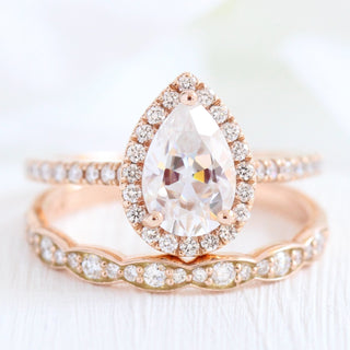 Stunning 1.50ct pear halo moissanite ring angled view showing its sparkle