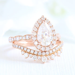 Graceful 1.50ct pear halo moissanite ring angled view showing its sparkle