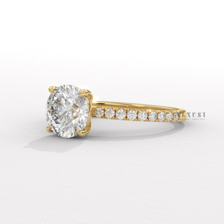 Half pave round moissanite ring close up