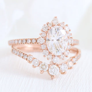 Delicate 1.50ct oval halo moissanite ring angled view showing its sparkle