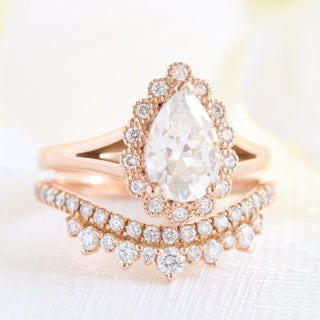 Chic 1.60ct pear halo moissanite ring angled view showing its sparkle