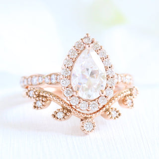 Gorgeous 1.50ct pear halo moissanite ring angled view showing its sparkle