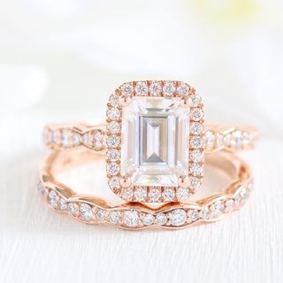 Brilliant 1.60ct emerald halo moissanite ring angled view showing its sparkle