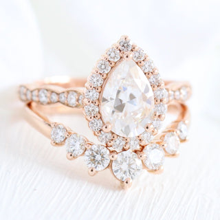Brilliant 1.60ct pear halo moissanite ring angled view showing its sparkle