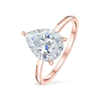 Bold 1.33ct pear hidden halo moissanite ring top view