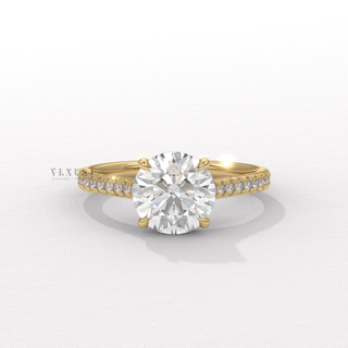 Round cut moissanite engagement ring with pave cathedral setting